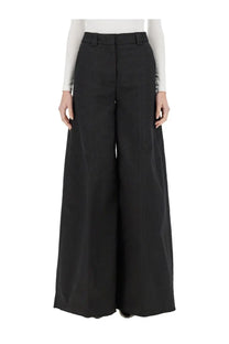 Thelatest women’s wide pant Alma black featuring sleek tailored black wide-leg trousers with a structured waistband
