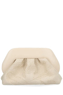 Cream-colored themoirè women’s bios bag clutch with soft sculpted top edge and embroidered leaf patterns on textured fabric