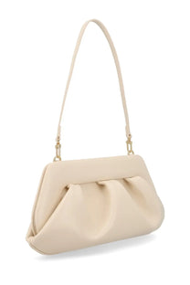 Cream-colored faux leather clutch bag with soft ruched front and slender shoulder strap by Themoirè Women