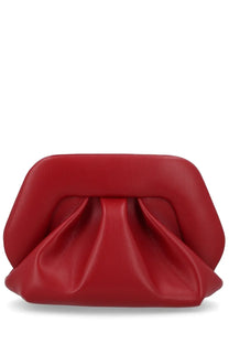 A vibrant red structured clutch with soft pleated center and smooth leather finish from Themoirè women’s Borsa Bios small collection