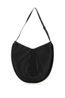 Themoirè women’s tike bag black leather hobo bag with sleek curved silhouette and adjustable shoulder strap