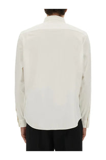 Theory men’s shirt Sylvain white is a crisp off-white long-sleeved button-down shirt with a classic collar and stitched cuffs