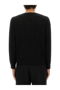 Theory men’s wool jersey black long-sleeved knit sweater with simple crew neck and smooth uniform texture