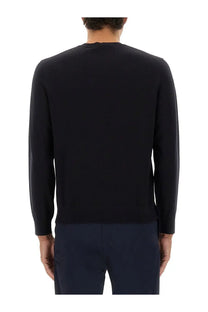 Theory men’s black wool crewneck sweater with long sleeves and jersey fabric for versatile layering