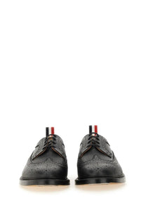 Thom browne men’s brogue classic longwing black leather oxford shoes with perforated detailing and striped laces