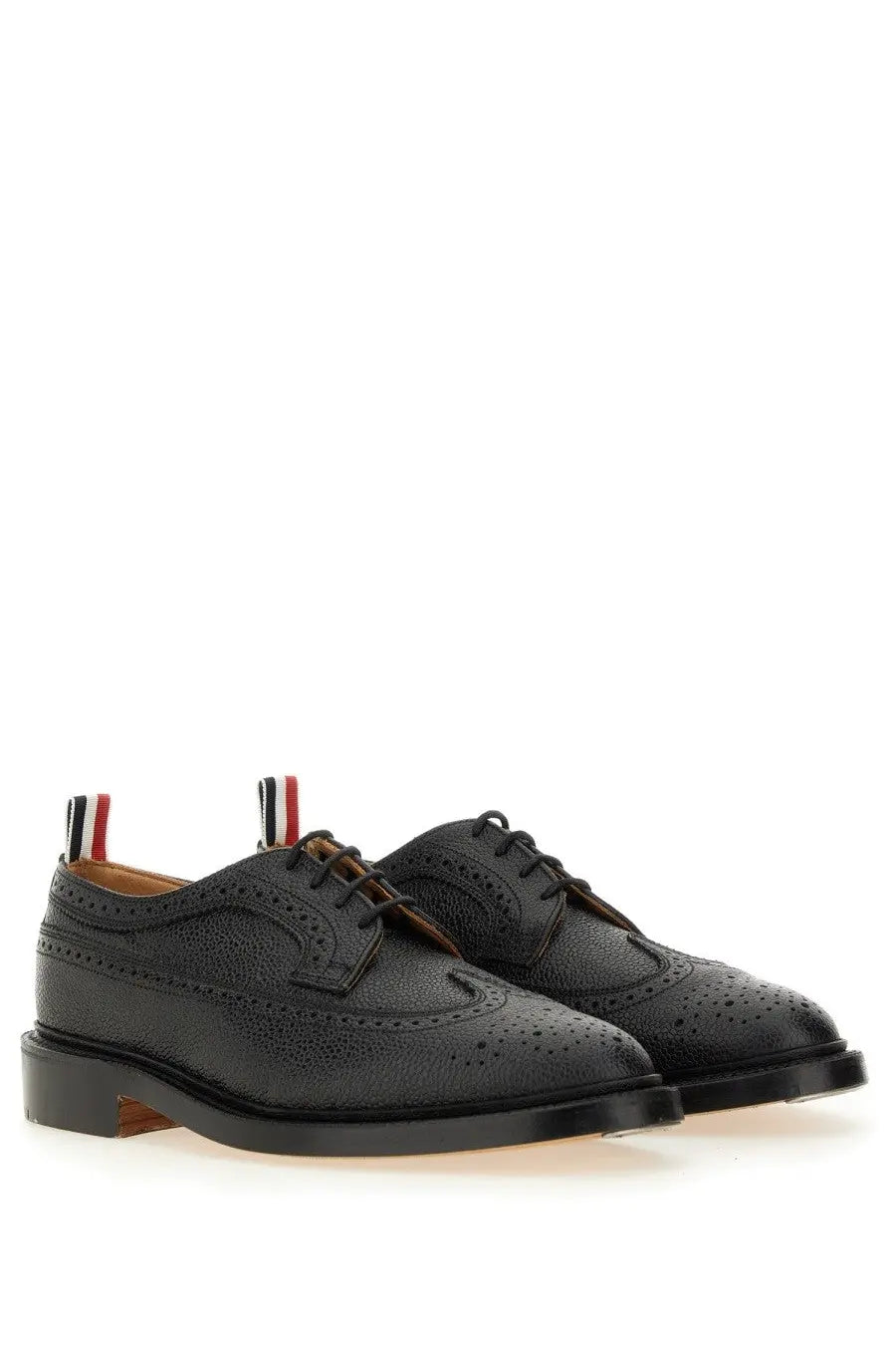 Thom Browne men’s brogue classic longwing black leather oxford shoes with textured surface and red white blue laces