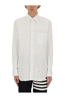 Thom Browne men’s white cotton button-up shirt with long sleeves chest pocket and small hem label