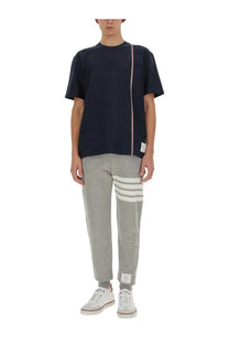 Thom Browne men’s navy blue jersey shirt with short sleeves and vertical stripe detail on the side