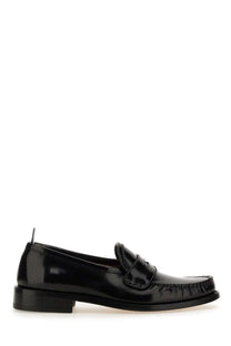 Thom Browne men’s black leather loafer in patent leather with a glossy finish and stitched detailing