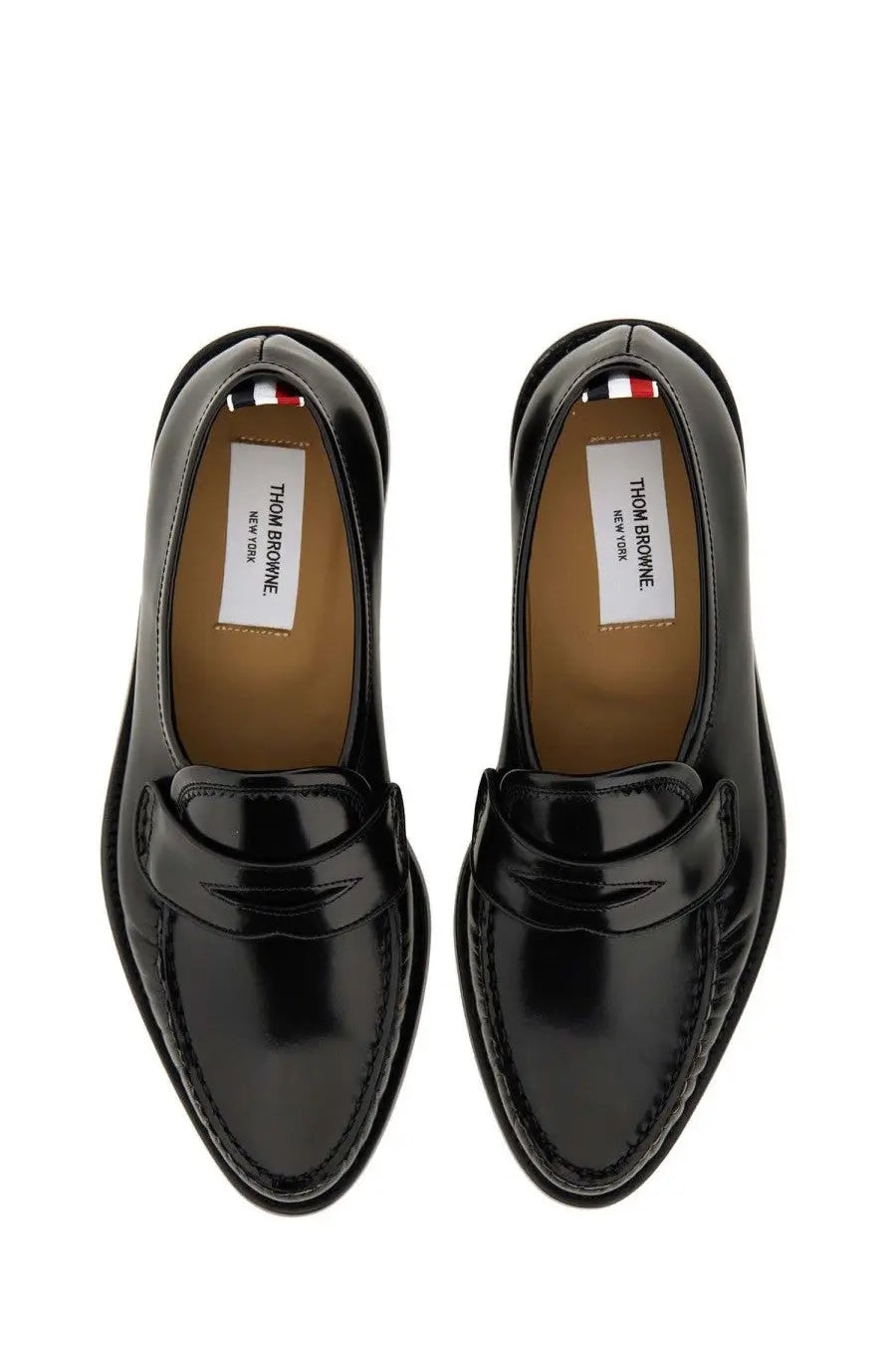 Thom Browne men’s leather loafer black featuring black patent leather with polished finish and classic slip-on design
