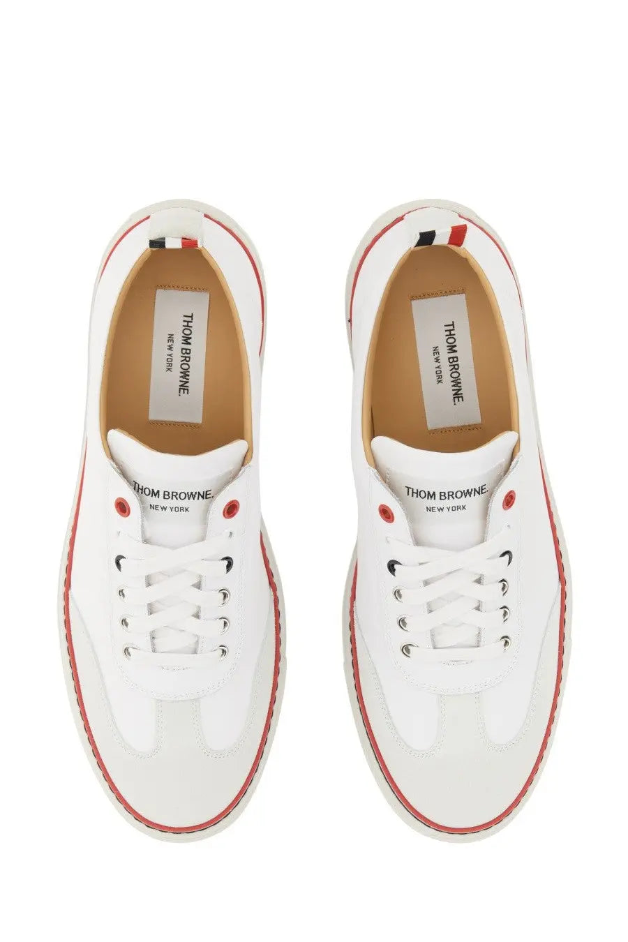 Thom Browne men’s low top leather sneakers white with red stitching and black eyelets