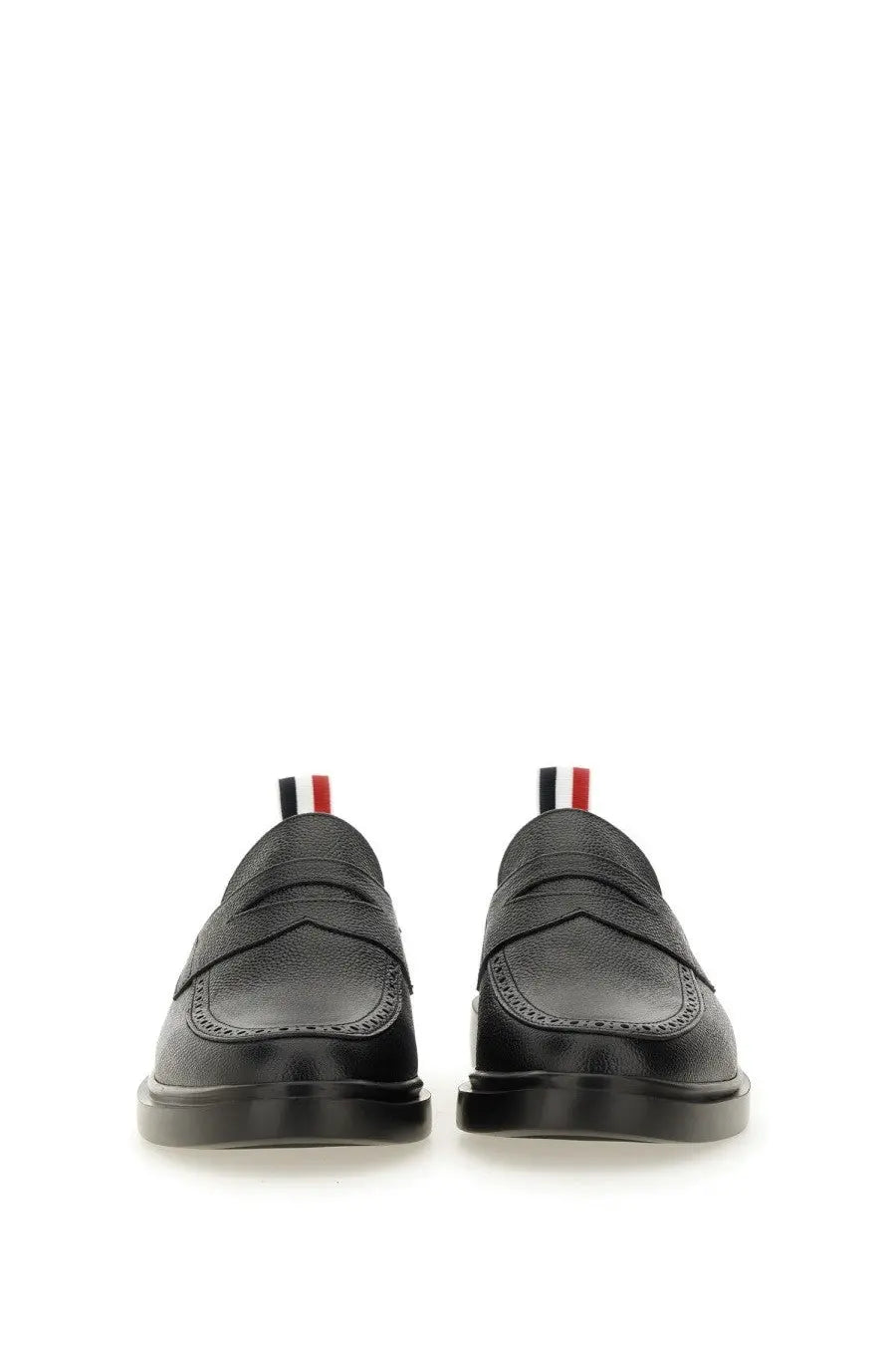 Thom Browne men’s moccasin penny black leather loafers with classic broguing and red white black striped pull tabs