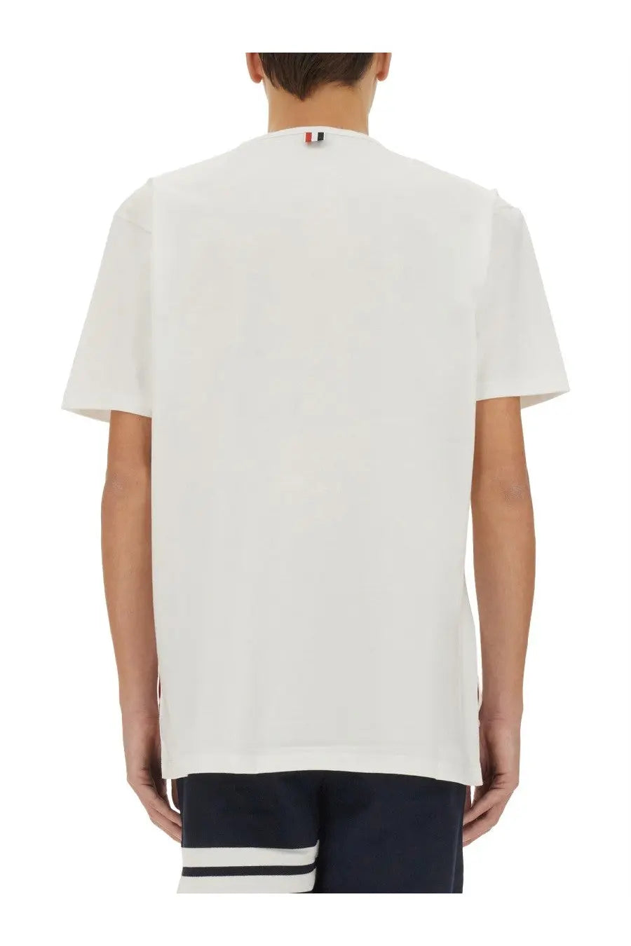 Thom Browne men’s white cotton t-shirt with a small red white and blue logo at the neckline