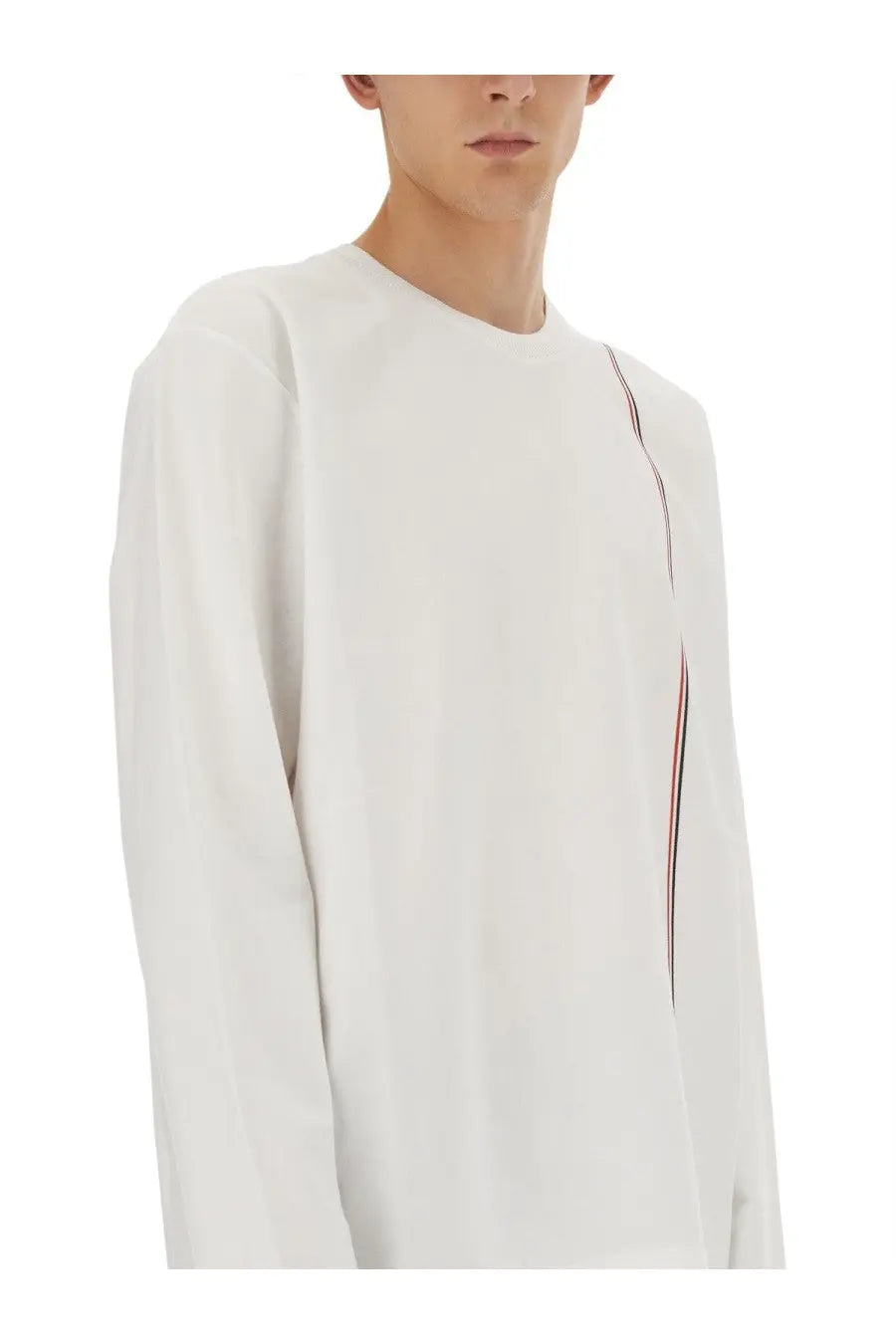 Thom Browne men’s white long-sleeved crewneck sweater with subtle vertical stripe detail along the side seam