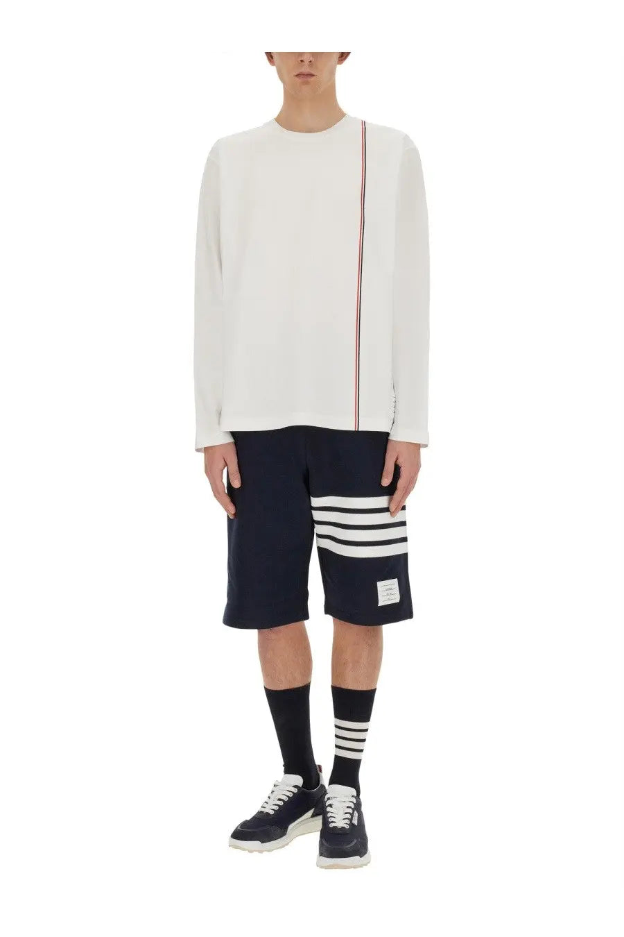 Thom Browne men’s white long-sleeved shirt with red white and blue vertical stripe detail on the side