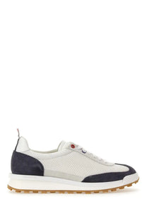 Thom Browne men’s sneaker tech runner blue in white and navy mesh with suede accents and red eyelet detail