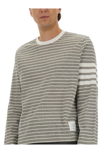 Thom Browne men’s grey long-sleeve striped sweater with ribbed crew neck and white sleeve stripes