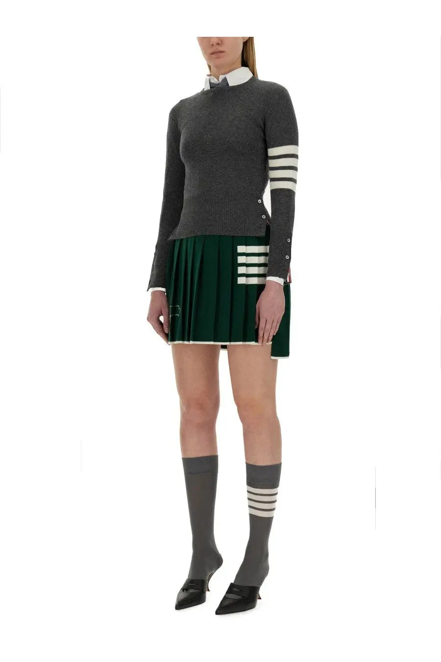 Thom Browne women’s grey cashmere sweater with dark gray knit, white stripes on sleeves and skirt, classic collar, and buttons