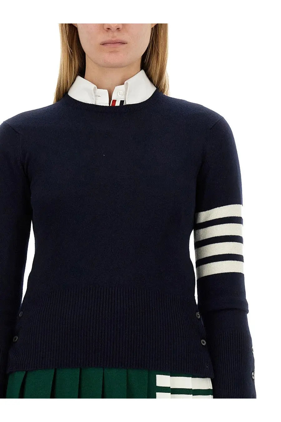Thom Browne women’s navy blue cashmere sweater with three white stripes on sleeves and ribbed hem