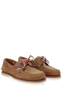 Timberland men’s moccasin classic boat brown tan leather boat shoes with white stitching and reddish pink laces