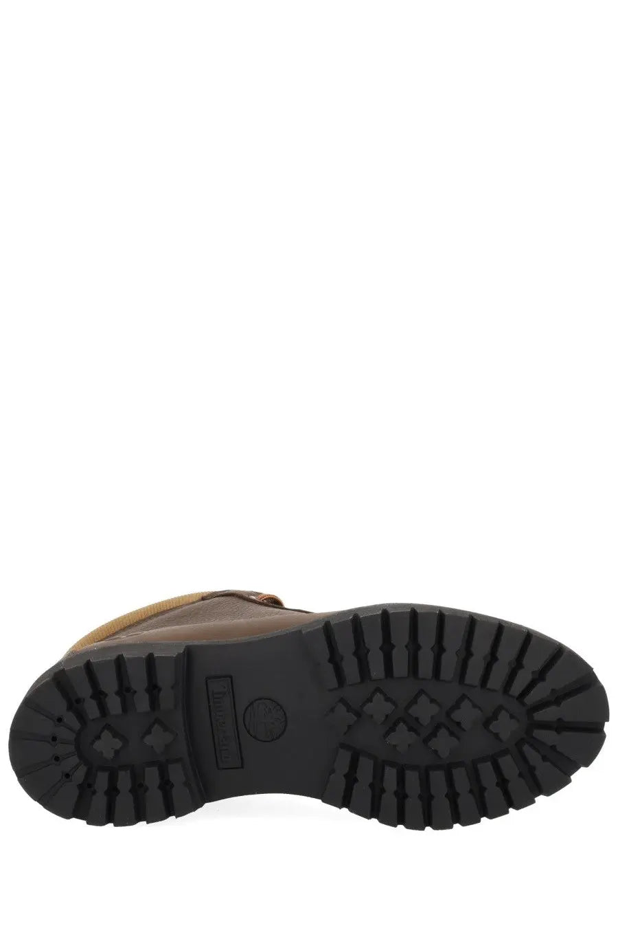 Timberland men’s waterproof chukka boot in brown leather with rugged black rubber sole and embossed logo on the heel back