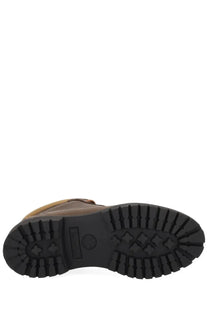 Timberland men’s waterproof chukka boot in brown leather with rugged black rubber sole and embossed logo on the heel back