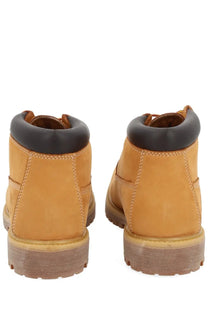 Timberland men’s waterproof chukka boot yellow with tan leather, black rubber toe caps, and thick soles