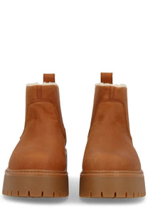 Timberland women’s leather boot brown tan suede chelsea boot with plush white shearling lining and chunky rubber sole