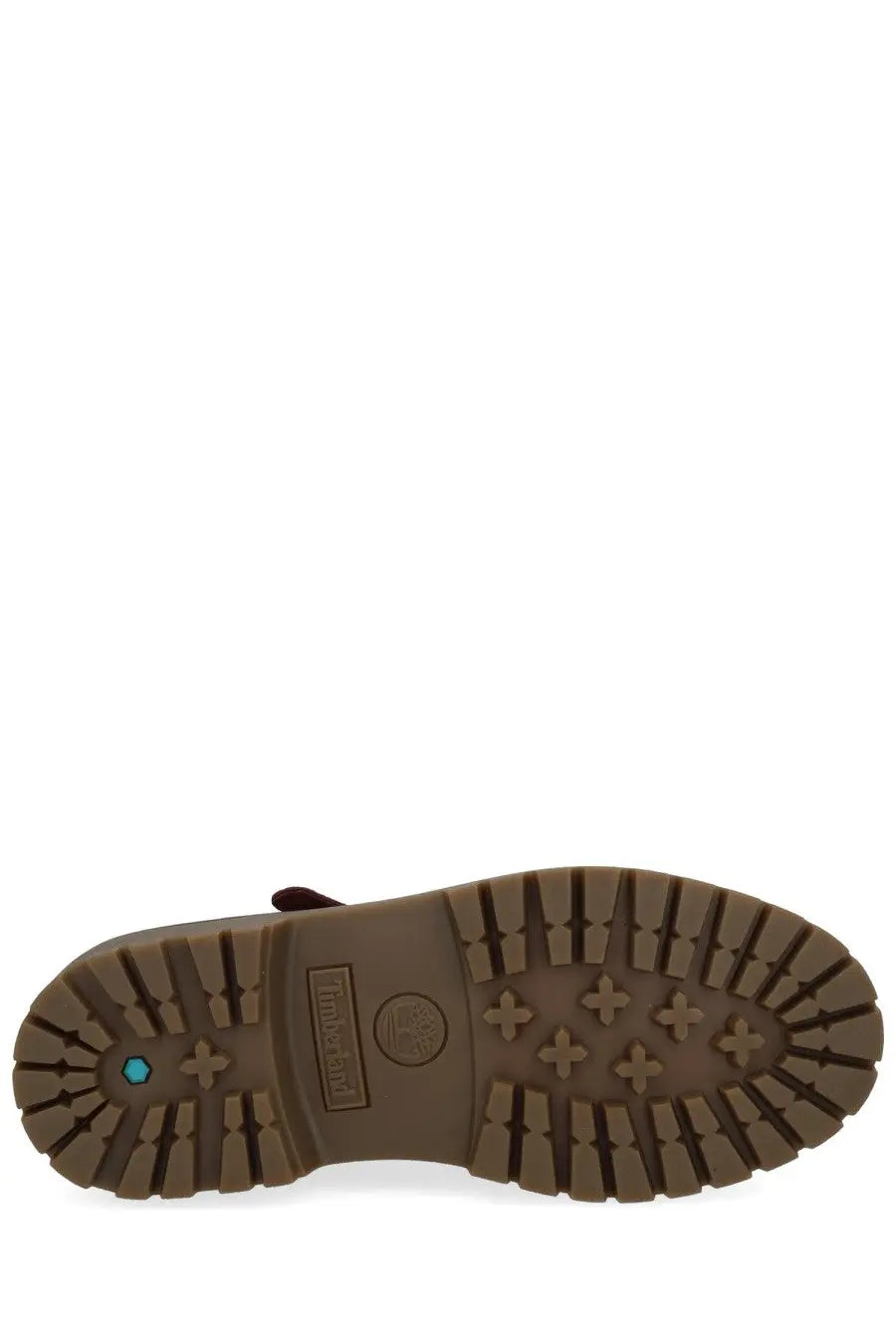 Timberland women’s loafer red showing brown rubber sole with textured tread and small turquoise accent near the heel