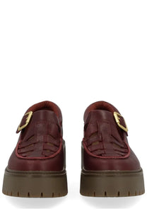 Timberland women’s loafer red maroon leather with gold-tone buckle braided vamp and chunky brown platform sole