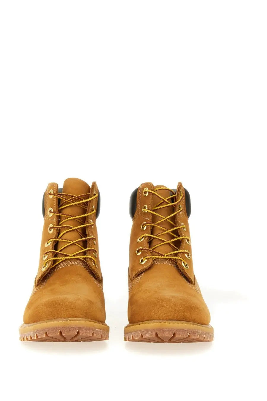 Timberland women’s waterproof lace up boot yellow tan suede with gold laces and black rubber heel tabs back view