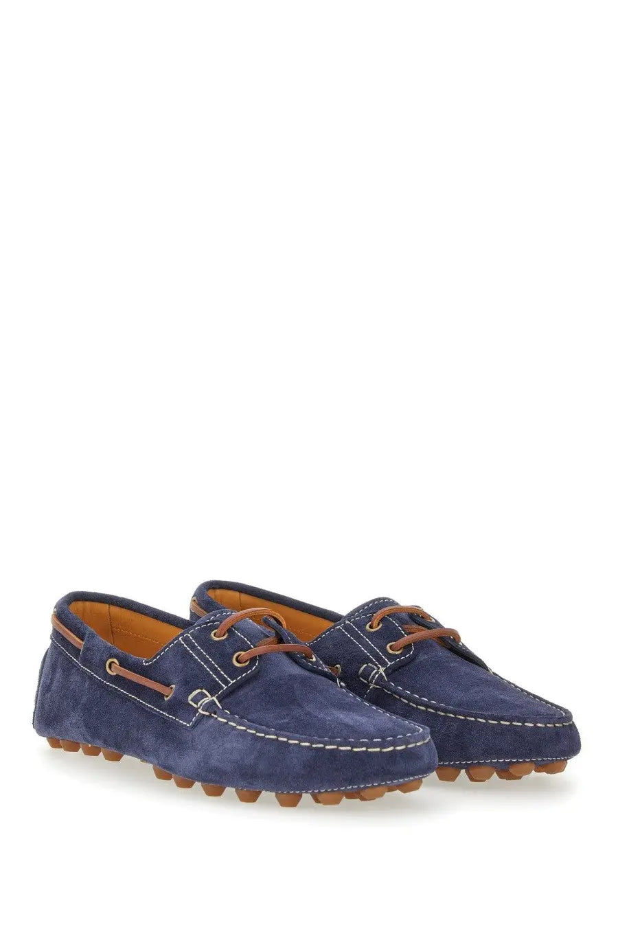 Tod’s men’s leather loafer in navy blue suede with tan laces and textured rubber sole for stylish comfort