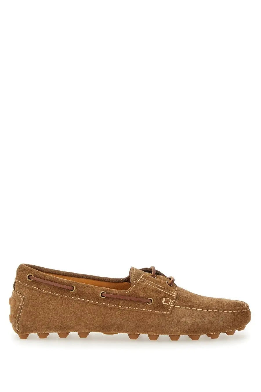 Tod’s men’s leather loafer brown in tan suede with brown laces and a textured rubber sole visible from the side