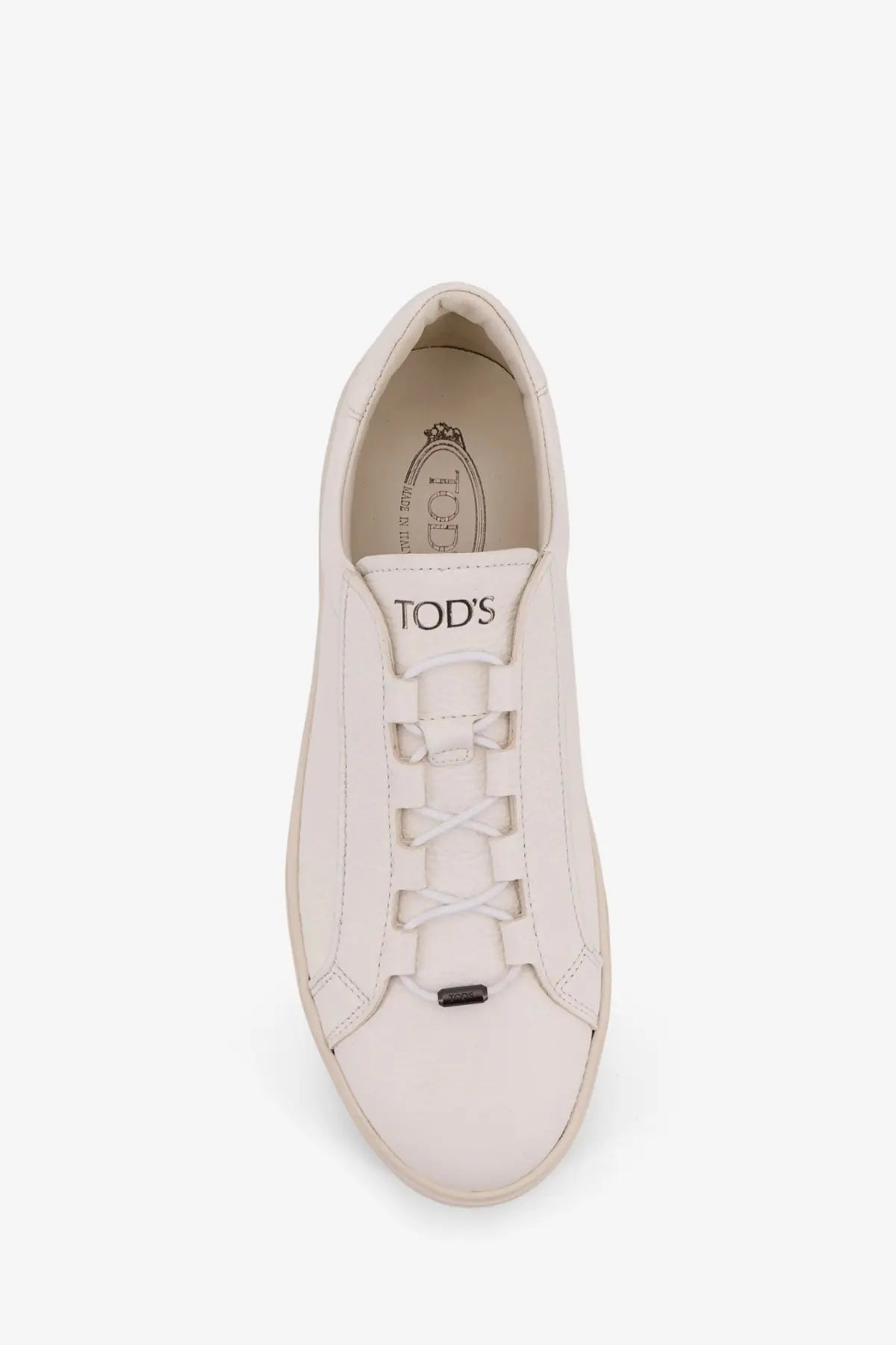 Tod’s men’s white leather sneakers with minimalist design and signature lacing system for casual wear