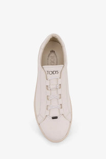 Tod’s men’s white leather sneakers with minimalist design and signature lacing system for casual wear