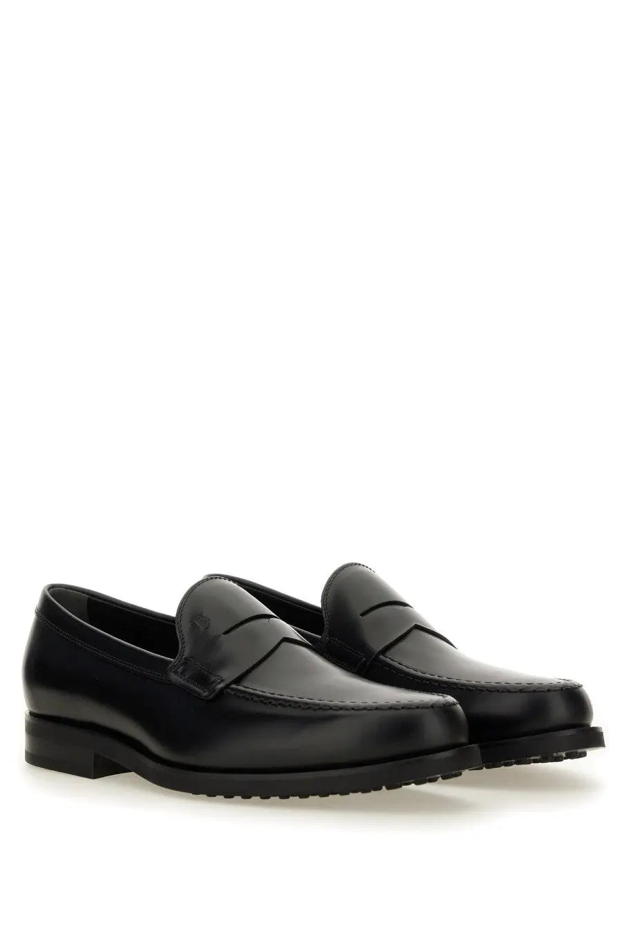 Tods men’s mocassino in pelle black black leather penny loafer shoes with polished finish and classic design