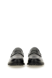 Tods men’s mocassino in pelle black black patent leather penny loafer shoes with sleek polished finish and classic design