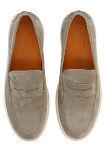 Tod’s men’s moccasin cassette beige gray suede loafers with classic moccasin design and white rubber soles