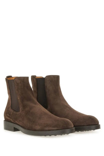 Tod’s men’s suede ankle boot in brown with black elastic side panels and a dark rubber sole