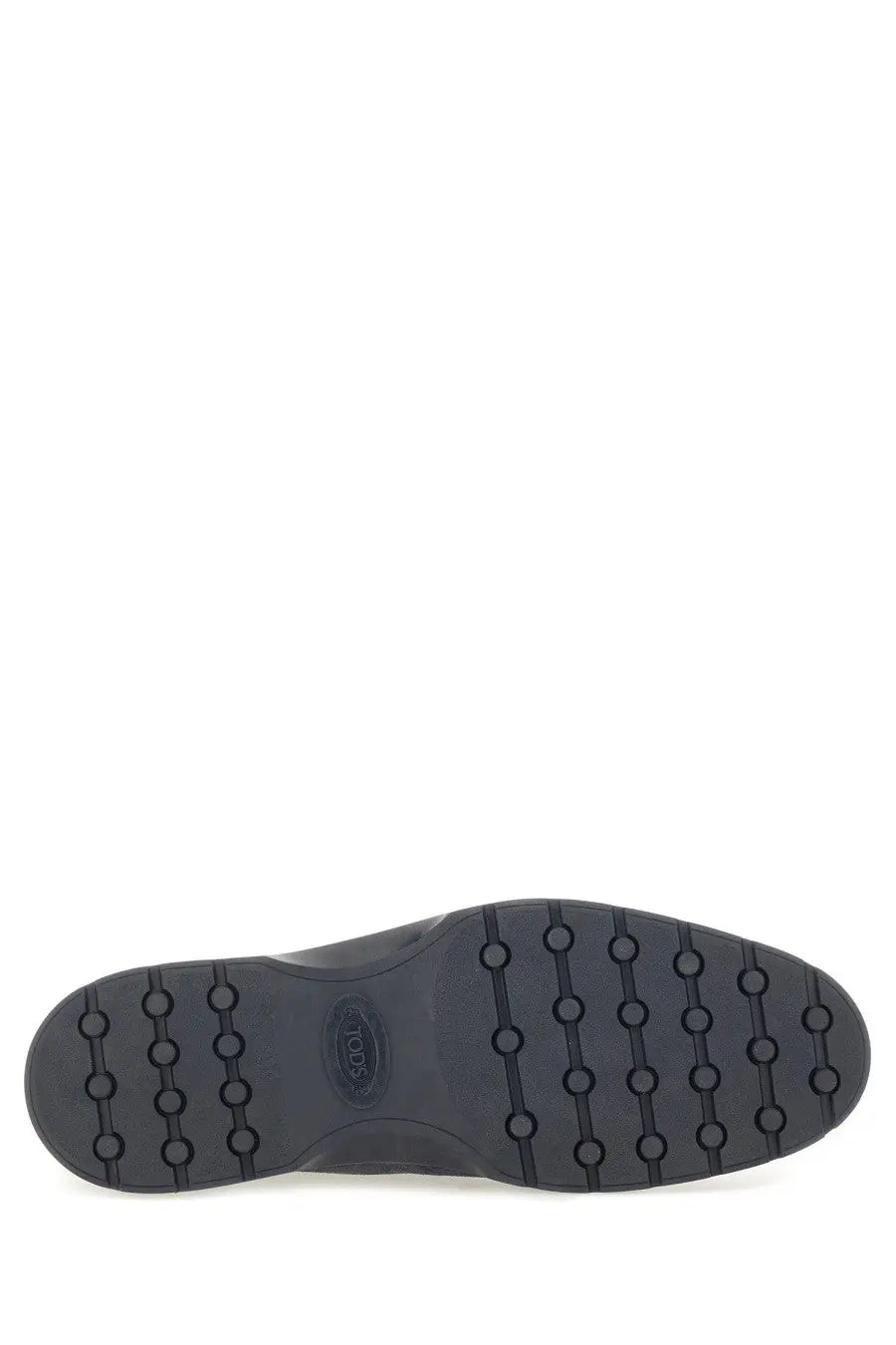 Black rubber sole with circular tread pattern and embossed tods logo on tods men’s blue suede loafer