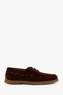 Tod’s men’s suede loafers in brown with tan rubber sole and metal eyelets for casual wear