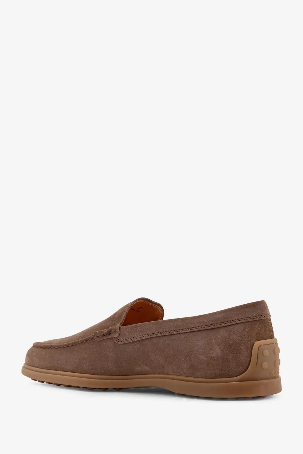 Tod’s men’s suede loafers brown in brown with tan rubber sole and circular stud detailing on the heel back view