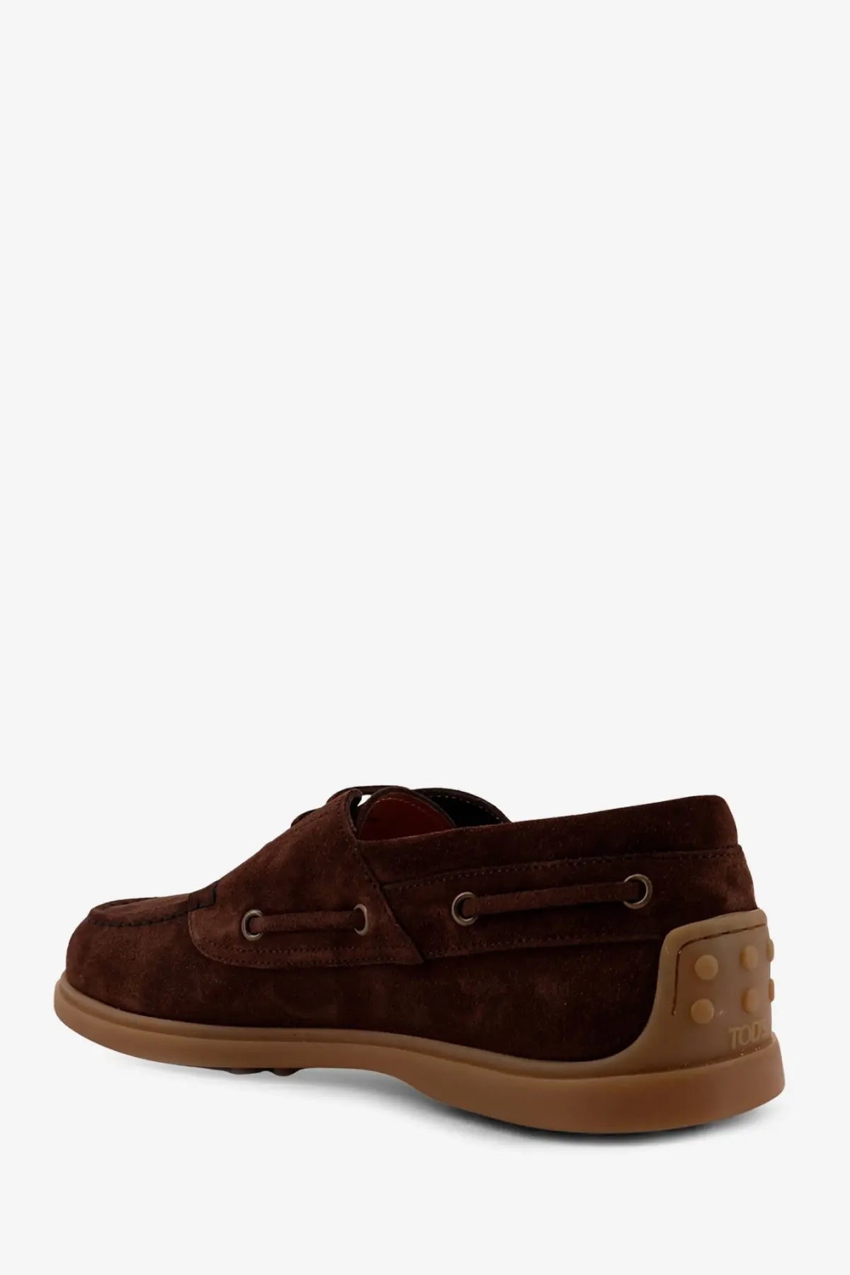 Tod’s men’s suede loafers brown with tan rubber sole and distinctive circular studs on the back heel