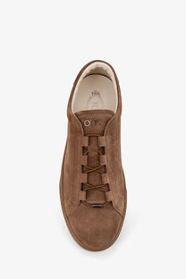 Tod’s men’s suede sneakers in brown feature a minimalist design with matching laces for a sleek look