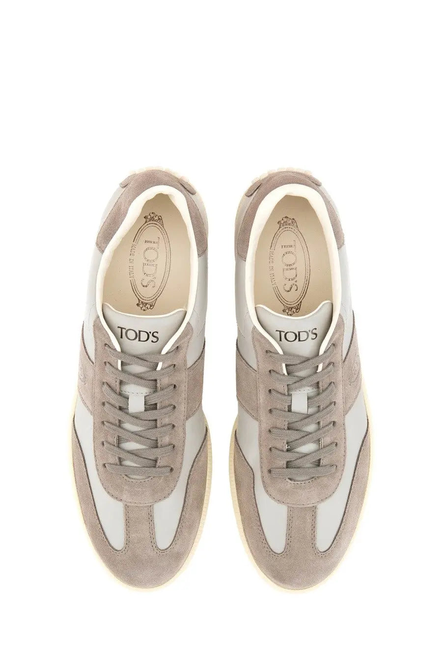 Tod’s men’s tabs sneaker beige low-top in beige suede and white leather with matching laces for casual wear