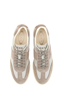 Tod’s men’s tabs sneaker beige low-top in beige suede and white leather with matching laces for casual wear