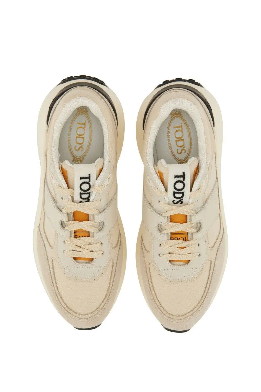 Tod’s women’s cream fabric and suede sneakers with black and orange accents and chunky sole in beige