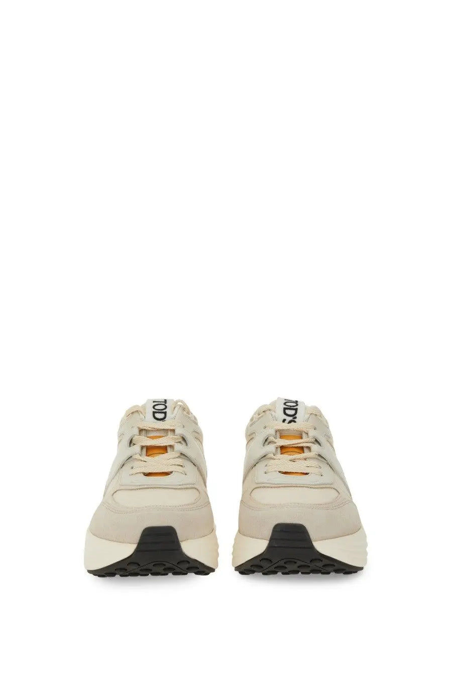 Tod’s women’s fabric and suede sneaker beige with cream color black rubber soles and orange lace accents