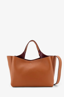 Tod’s women’s leather crossbody bag in brown tan leather tote with contrasting burgundy interior and handles