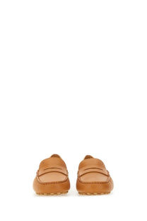Tod’s women’s leather gommino loafer beige in tan leather with classic moccasin design and stitched detailing